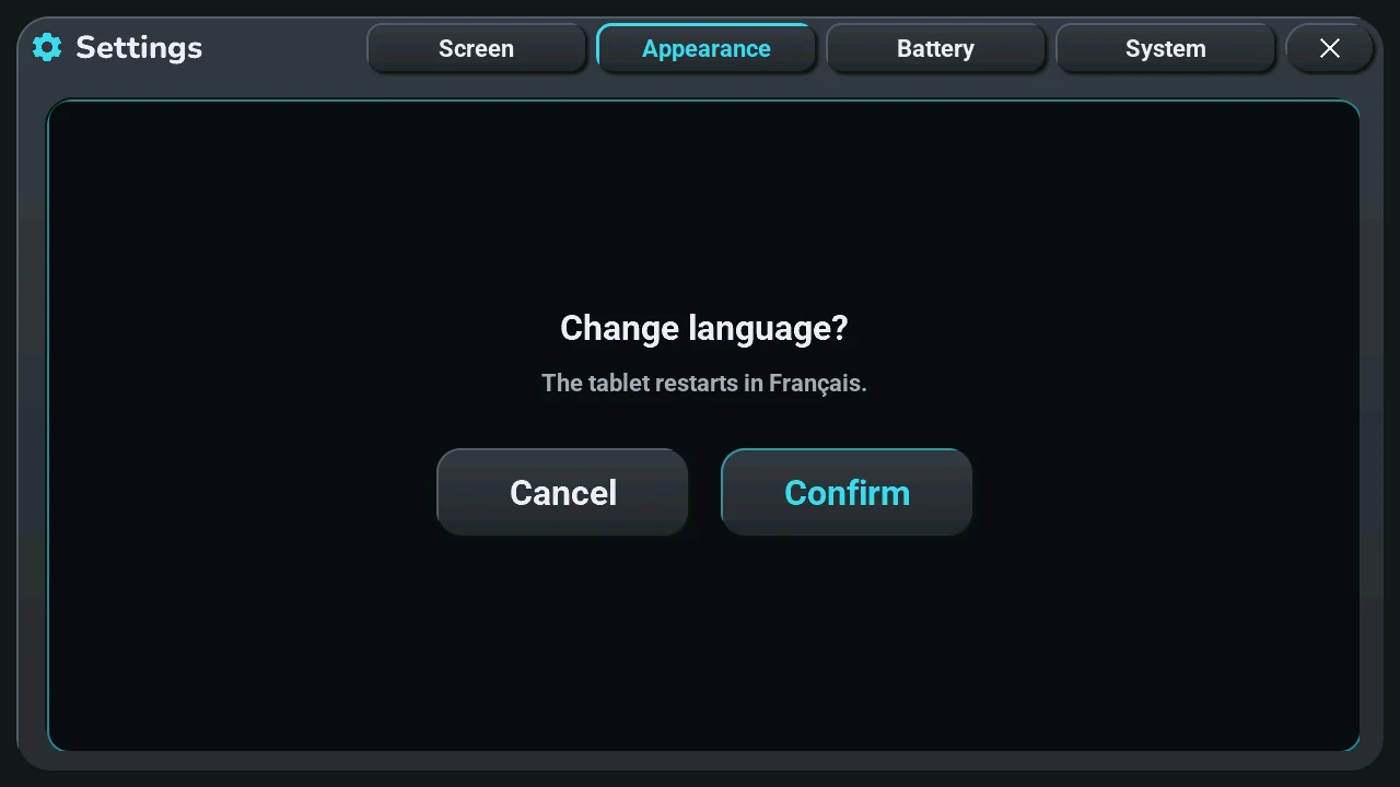 Before changing the language, the tablet asks: Cancel or Confirm